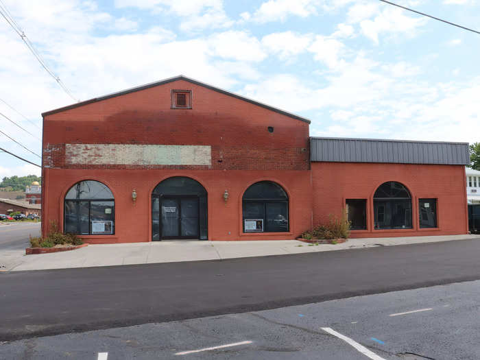 This brick building in downtown Sevierville once housed The Pines Theater, where Dolly Parton played her first paid gig.