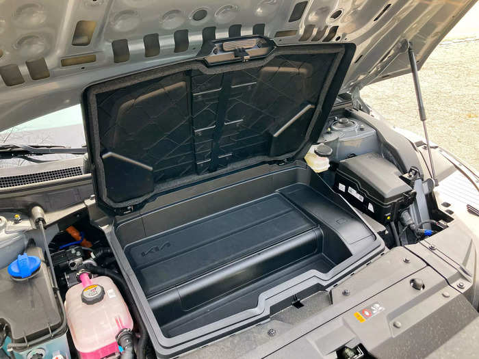 The Kia instead offers a small compartment that