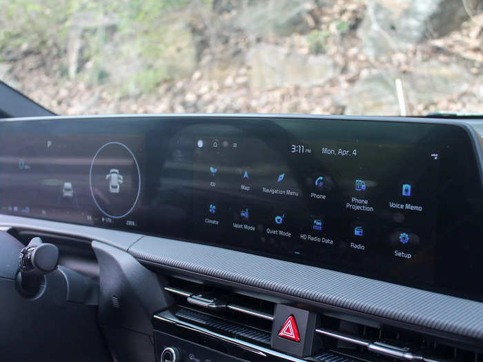 Up front, there are two 12.3-inch screens on a cool, curved panel.