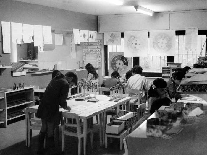 1970: Children played in a Montessori classroom.