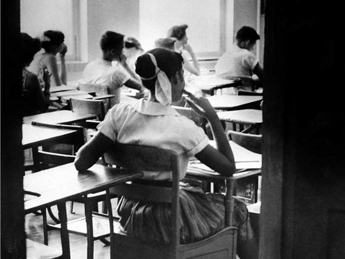 1956: Black students at Clinton High School in Tennessee sat at the back of the classroom.