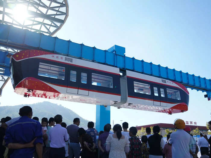 The Red Rail glides through the air suspended about 10 meters, or 33 feet, above the ground.