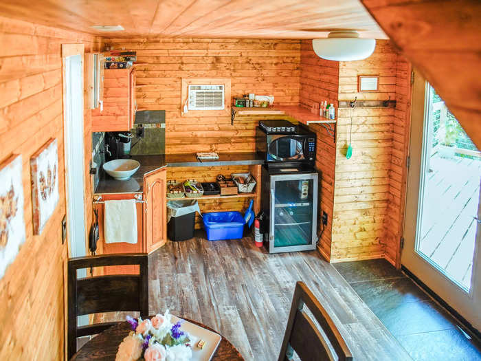 The front door opened into one central room that included a kitchenette. It came with a microwave, fridge, coffee maker, and dishes, unlike most hotels I