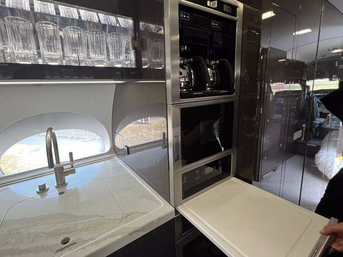 There was also a coffee pot, oven, and pull-out cutting board on the display jet.