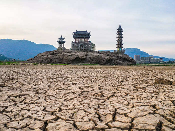 The 1,000-year-old historic Luoxingdun islet stands exposed as Poyang Lake disappears.