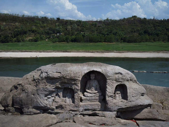 The drought has unveiled a Buddhist statue that was submerged for years.