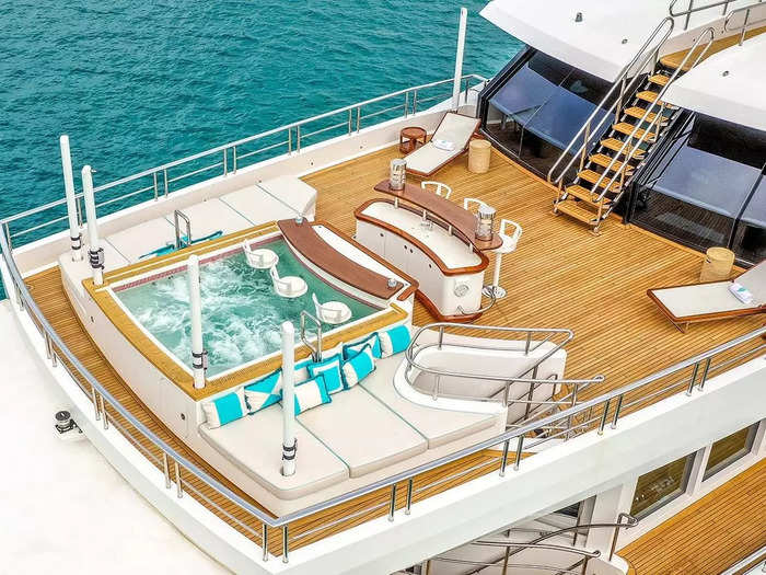 The aft deck is "great for relaxing in the tub and having a cocktail while the sun goes down," the auctioneers say. The fore deck can be used "as a golf driving range complete with biodegradable, fish food, golf balls," they say.