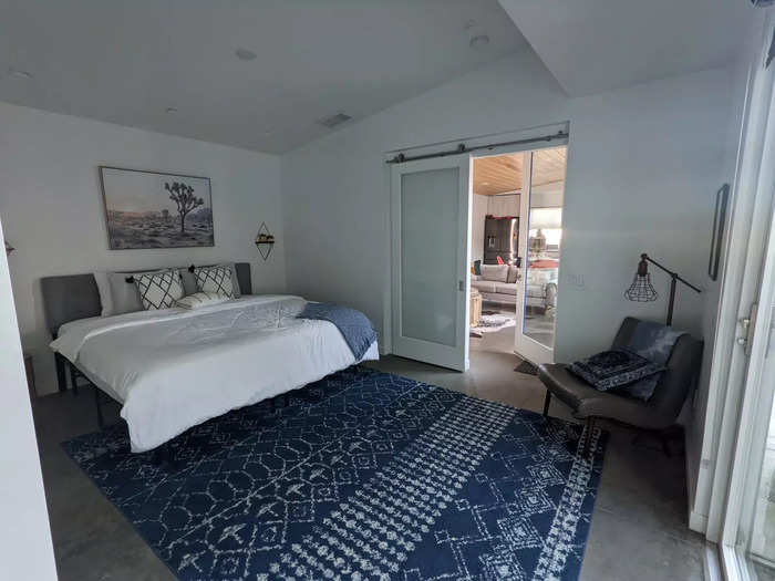 The bedrooms have ensuite bathrooms and separate entrances from the surrounding central patio area.