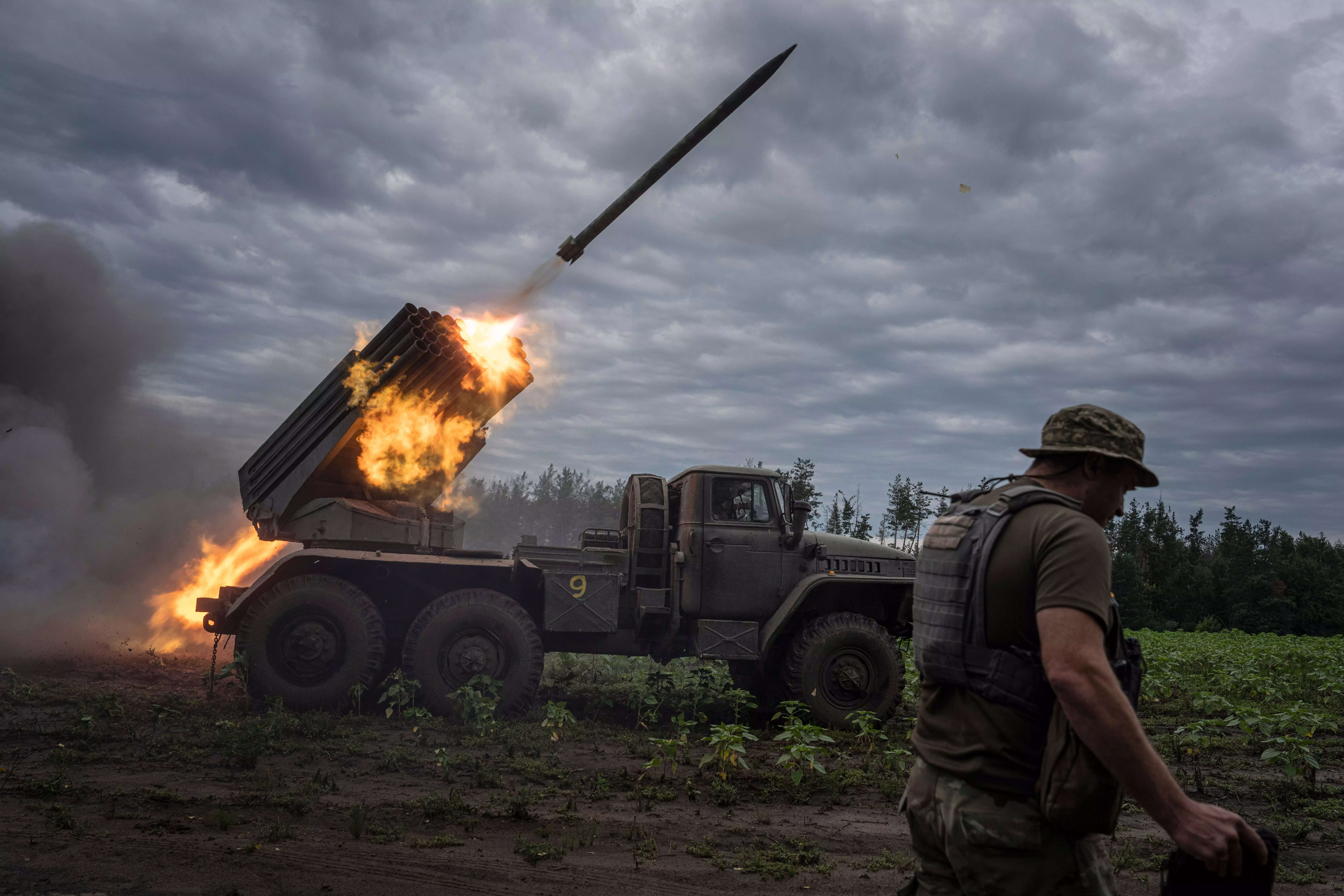 Ukrainian MSLR BM-21 "Grad" shoots toward Russian positions at the frontline in Kharkiv region, Ukraine, on Tuesday, Aug. 2, 2022