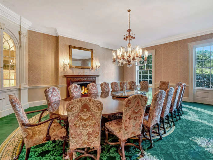 The formal dining room, pictured below, can sit 17 guests.