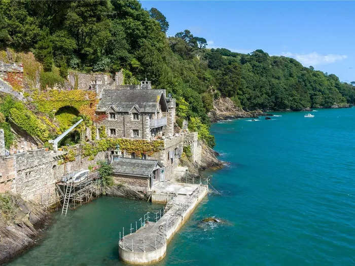 David Southwick spent 15 years building a five-story boathouse on the River Dart in Devon, England. Now it