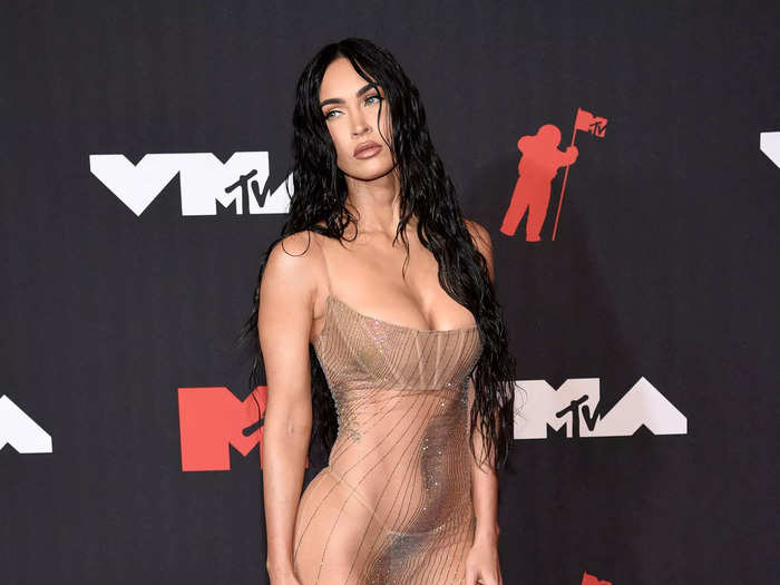 Whereas Megan Fox went with a barely-there Mugler dress that hugged her body.