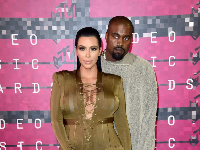 Kim Kardashian also had a memorable fashion moment that year: a green maternity gown with criss-cross straps.