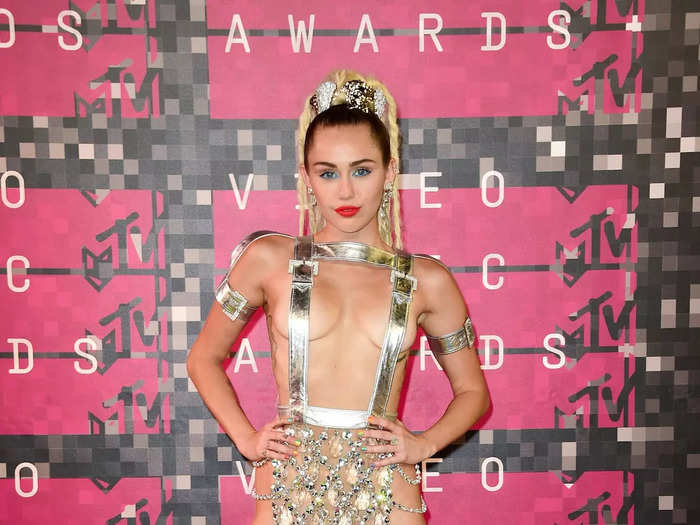 Miley Cyrus hosted the 2015 VMAs, and wore more accessories than clothes.