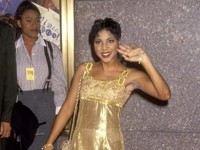 Toni Braxton shined on the 1994 red carpet in a sheer, gold minidress.