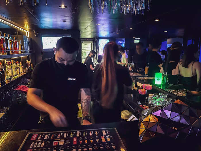 Feeling slightly out of place — I was alone and on a reporting trip, after all — I posted up at a bar near the back of the dance floor.