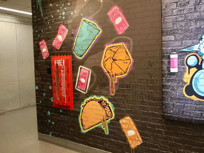 The artwork highlighted iconic Taco Bell items, like the Crunchwrap Supreme, tacos, and hot sauces.