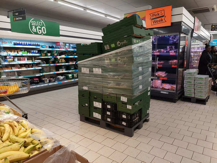 There was also a stack of fresh produce in the middle of an aisle, though there was plenty of space to walk around it.