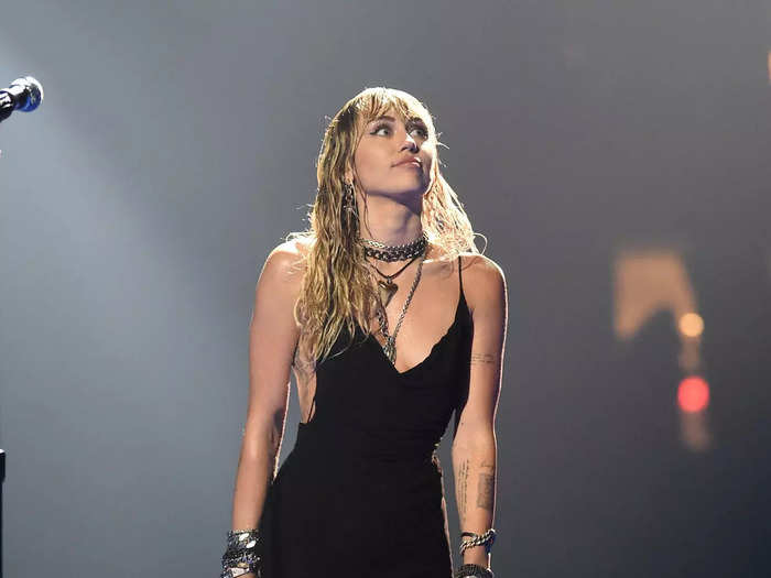 The little black dress Cyrus wore to perform "Slide Away" in 2019 was understated — but styled with wet hair and strappy, heeled sandals, it felt more daring.