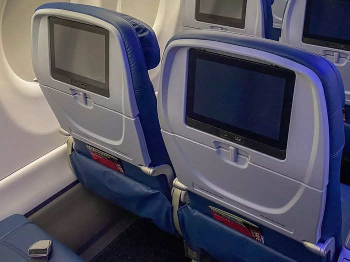 Like first and Comfort+, regular economy comes with inflight entertainment screens on the seatback.