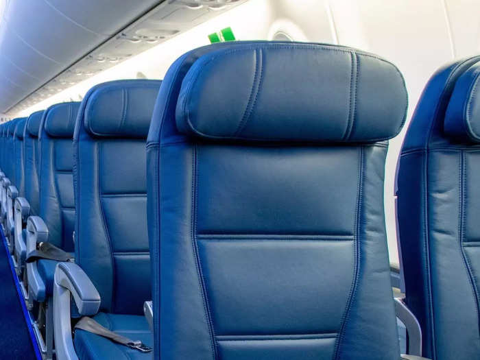 Both cabins offer adjustable headrests, making sleep easier for longer flights.