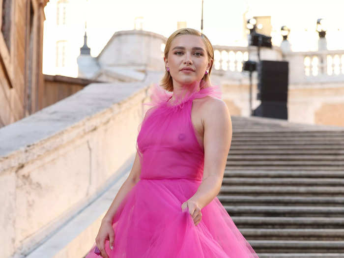 Florence Pugh attended the Valentino Haute Couture Fall/Winter 22/23 show in Rome wearing an entirely sheer pink tulle gown.