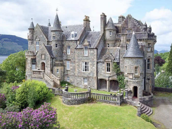 The castle overlooks a beautiful Scottish lake known as a loch.