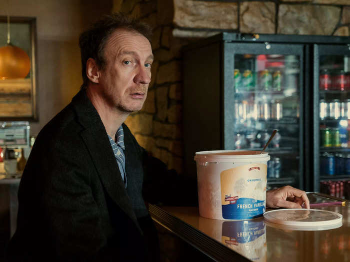 David Thewlis plays John Dee, the son of occultist Robert Burgess and his lover Ethel Cripps.