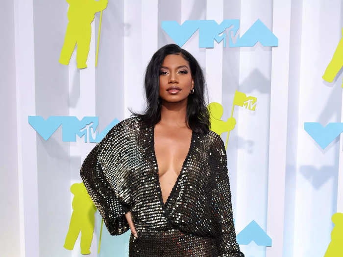 Taylor Rooks sparkled in a shimmering sheer dress that felt straight from the disco era.