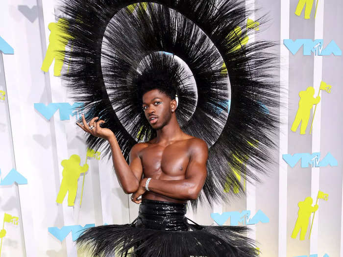 Lil Nas X stole the show with this dramatic feathered ensemble by Harris Reed.