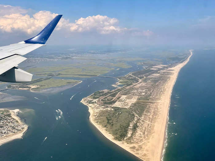 We flew over sailboats, jet skiers, beachgoers, and marshland.