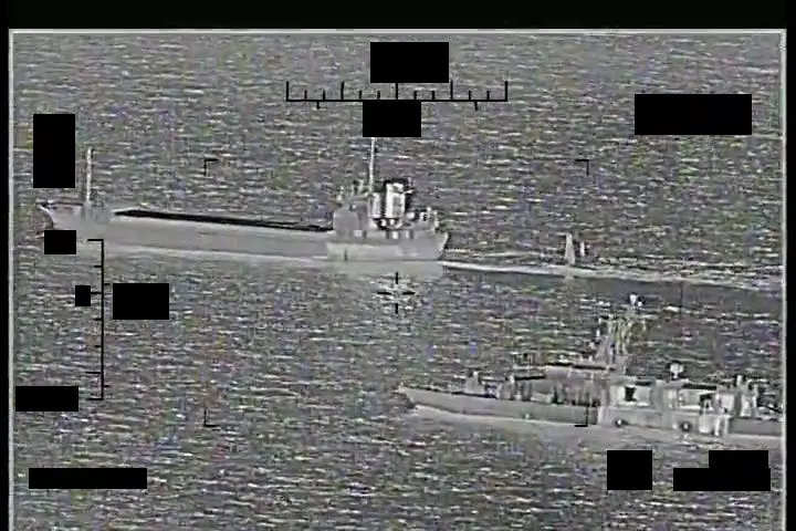 Screenshot of a video showing support ship Shahid Baziar, left, from Iran