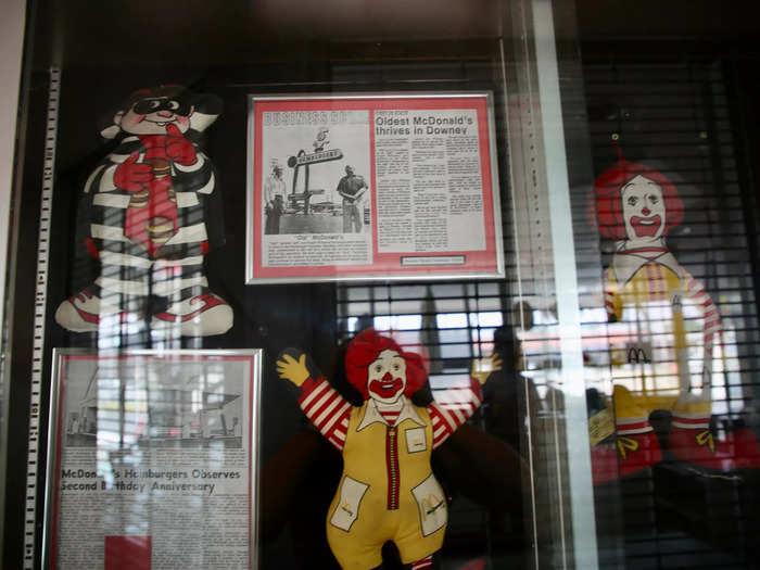 Photos and newspaper clippings showed the evolution of Ronald McDonald