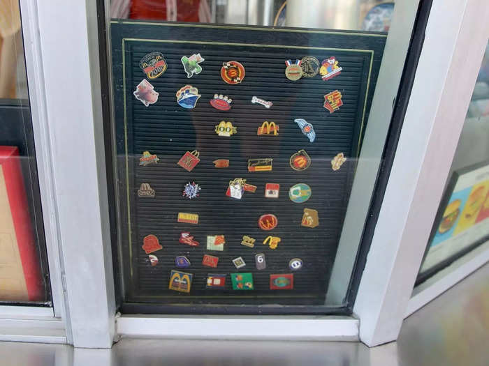 Pins of logos, menu items, and mascots were also used in decor.