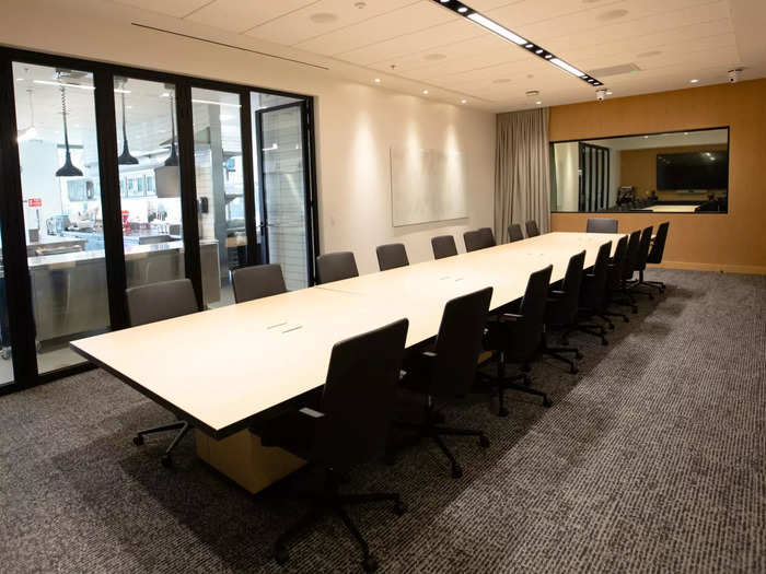 This conference room is used for executive meetings, and also for focus group meetings on the other side of a two-way mirror.