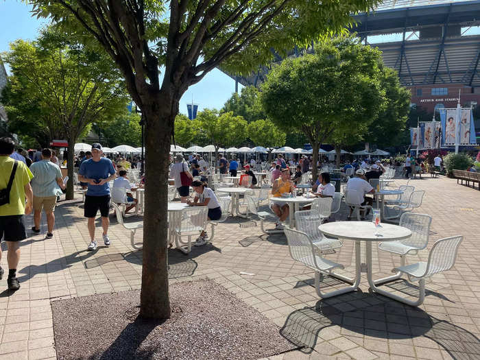 While there are a few canopies in the Food Village, many of the tables for eating are in the sun. You might want to chow down on something decadently fried or served hot, but you