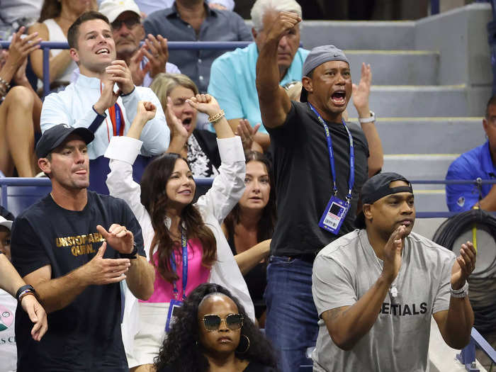 Fellow athlete Tiger Woods stood up and pumped his fist in the air in support of Williams.