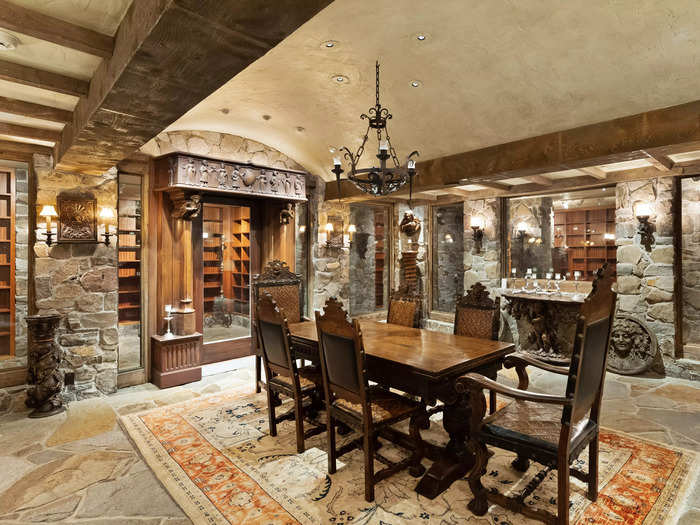 The main residence has two dining rooms, including one on the lower level situated next to a wine cellar.