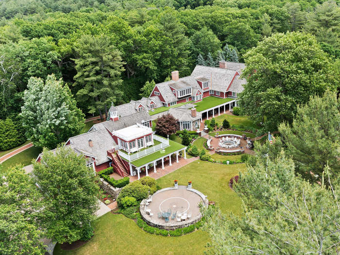 The sprawling estate is located about 2 hours outside of Boston in Leverett, Massachusetts. It encompasses 120,000 square feet of living space spread across eight separate structures, including a main house, a clubhouse, a spa, a pool cabana, two guest houses, and two car barns.