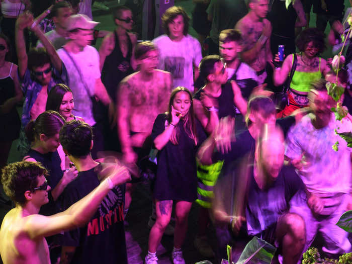 Revellers dance at a rave party in central Kyiv, Ukraine August 27, 2022.