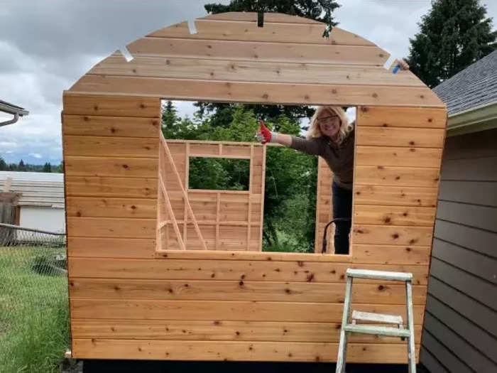 After putting in the framing, Fisher started installing her walls. To protect them from the elements, she waterproofed them with a wood sealer.