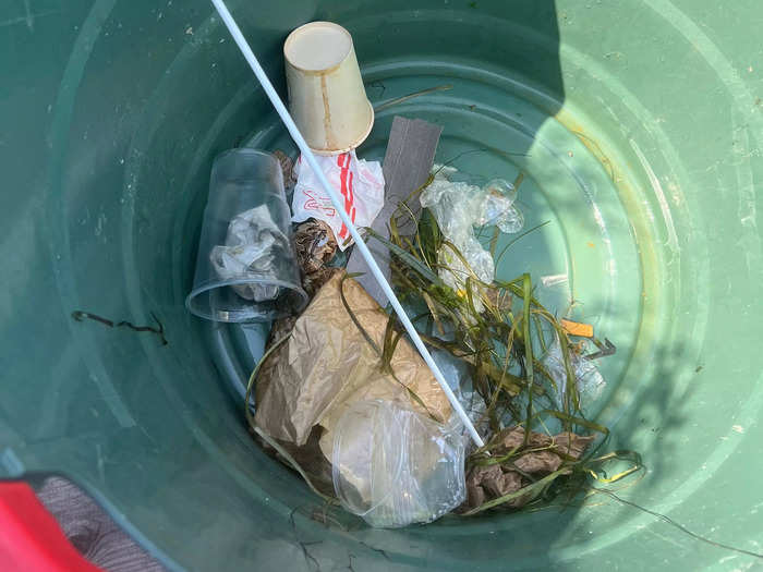 Our bucket was barely full when we returned to Green Island and handed it to an employee, but removing even a little trash can make a difference, Carstensen says.