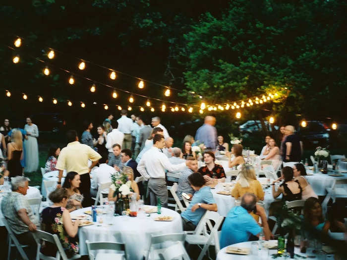 Jess and Houston borrowed much of their decor from loved ones, including tables, tablecloths, and lights.