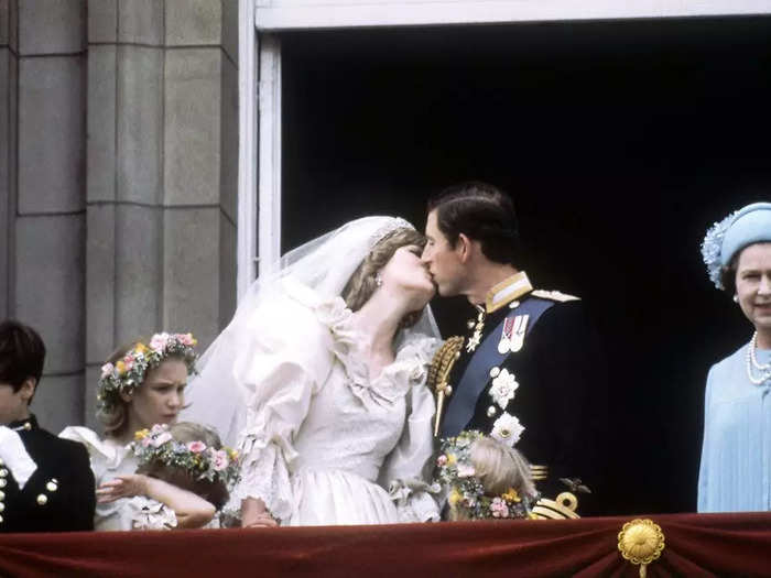 1981: The Queen looked over the crowd of 600,000 people who lined the streets of London on the day of Charles and Diana