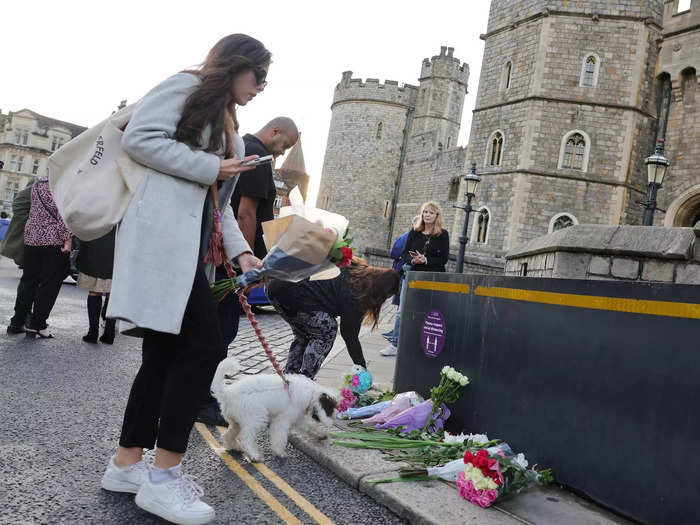 Well-wishers laid flowers outside the castle.