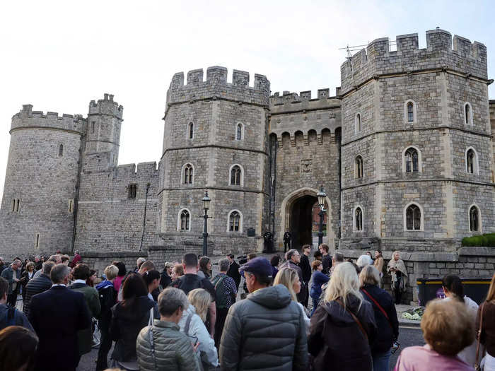 Mourners gathered at Windsor Castle to pay their respects to the late Queen.