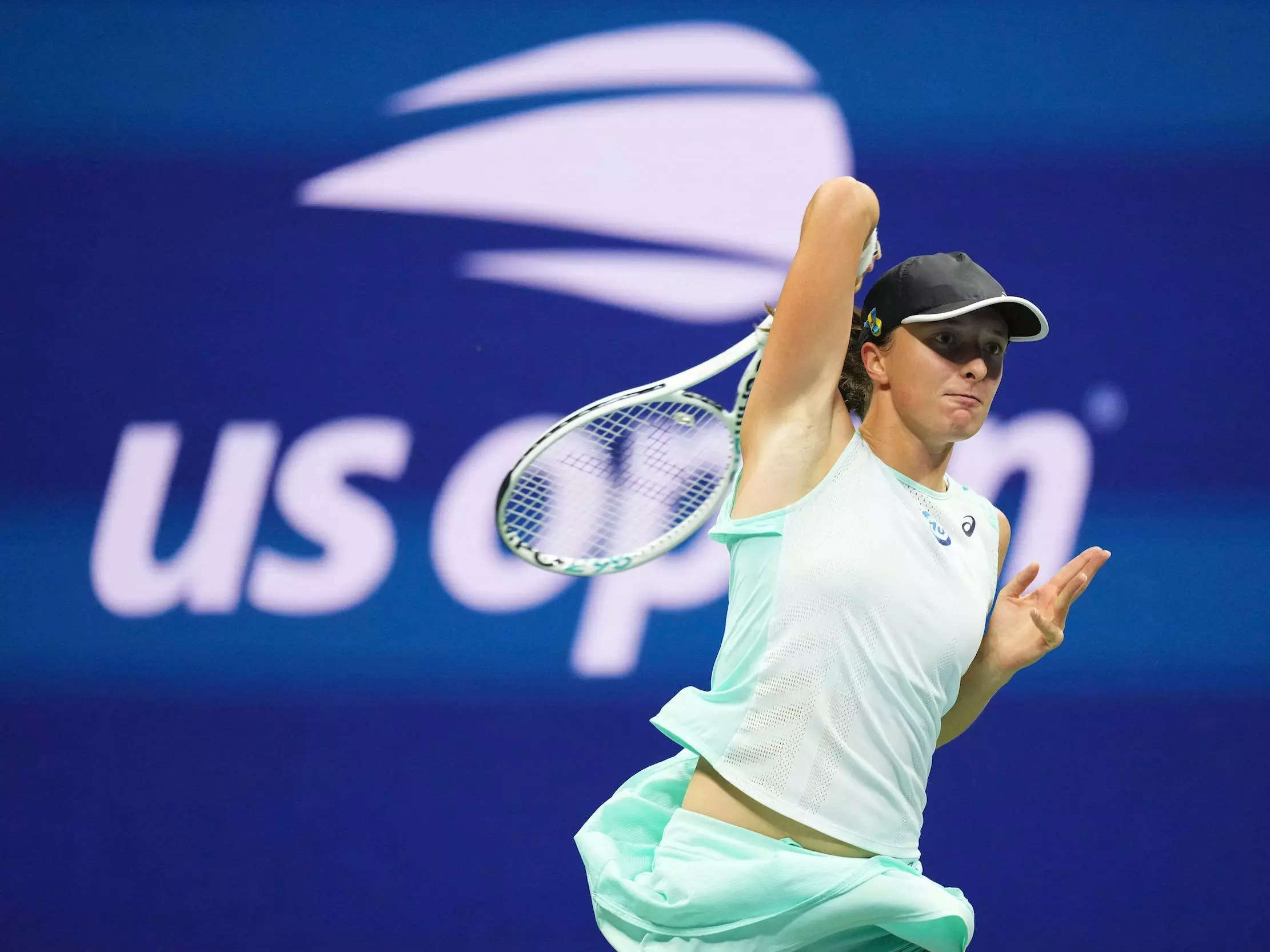 Iga Swiatek hits a shot during her US Open semifinal match against Aryna Sabalenka.