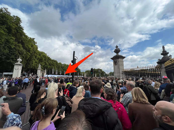 As I got closer to the palace, I noticed a line of white tents in front of the crowds. This is where TV presenters were filming live broadcasts.