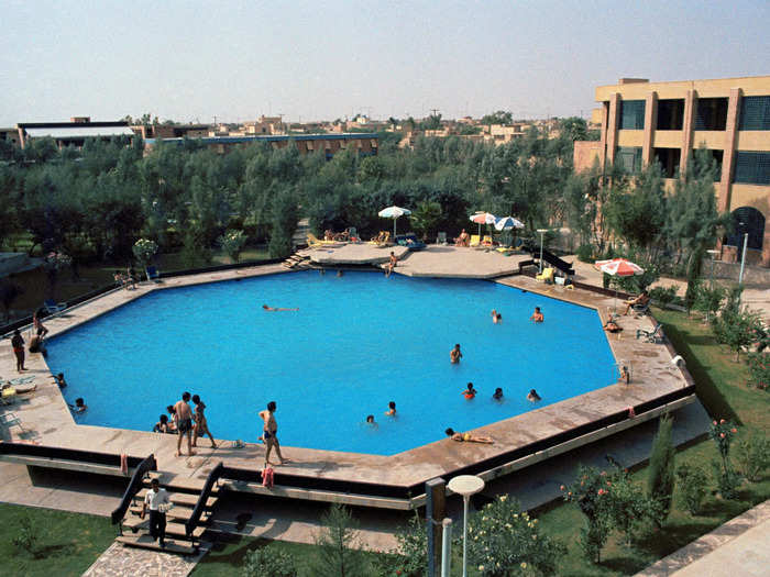 Here, Iranians swim in an octagonal swimming pool at the guesthouse of the Iranian National Oil Company.