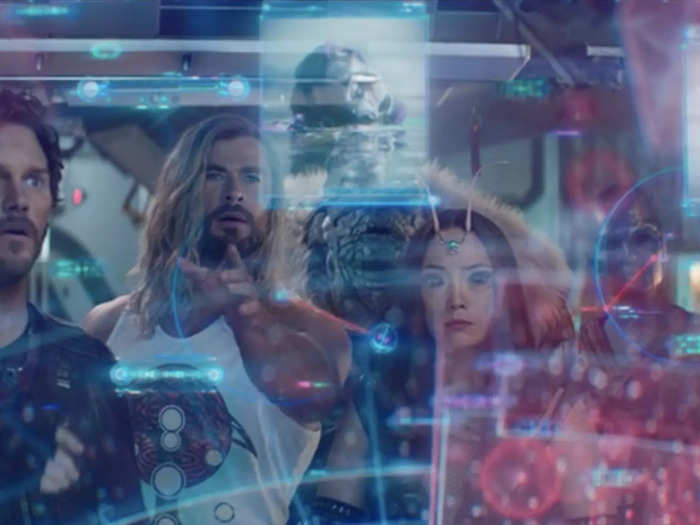 Thor and the Guardians take a look at a screen displaying various distress calls.